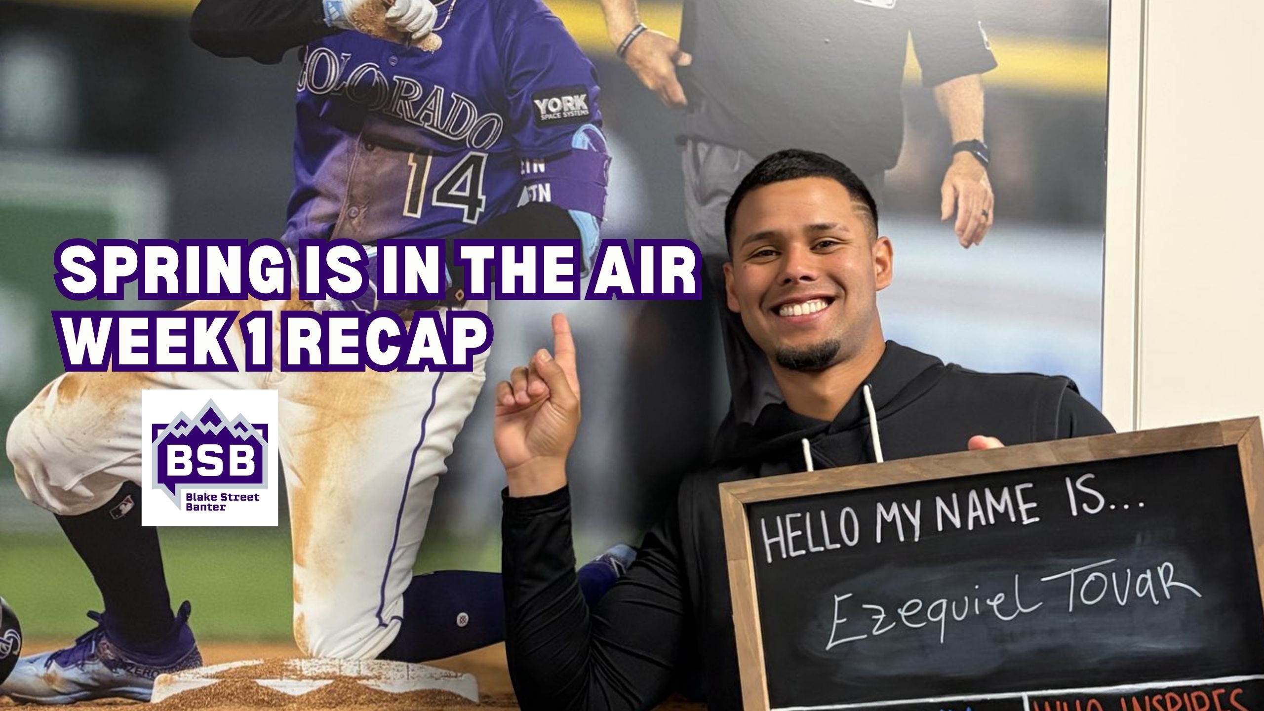 Ezequiel Tovar of the Rockies pointing to a picture of himself.